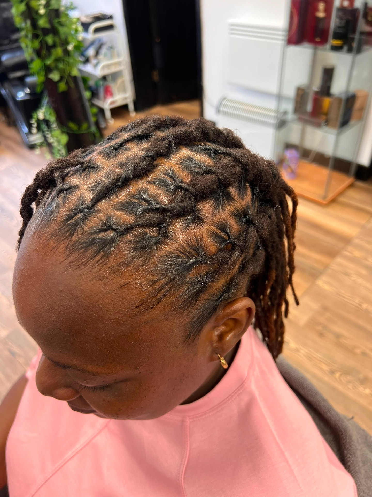 Neat short loc retwist from the side