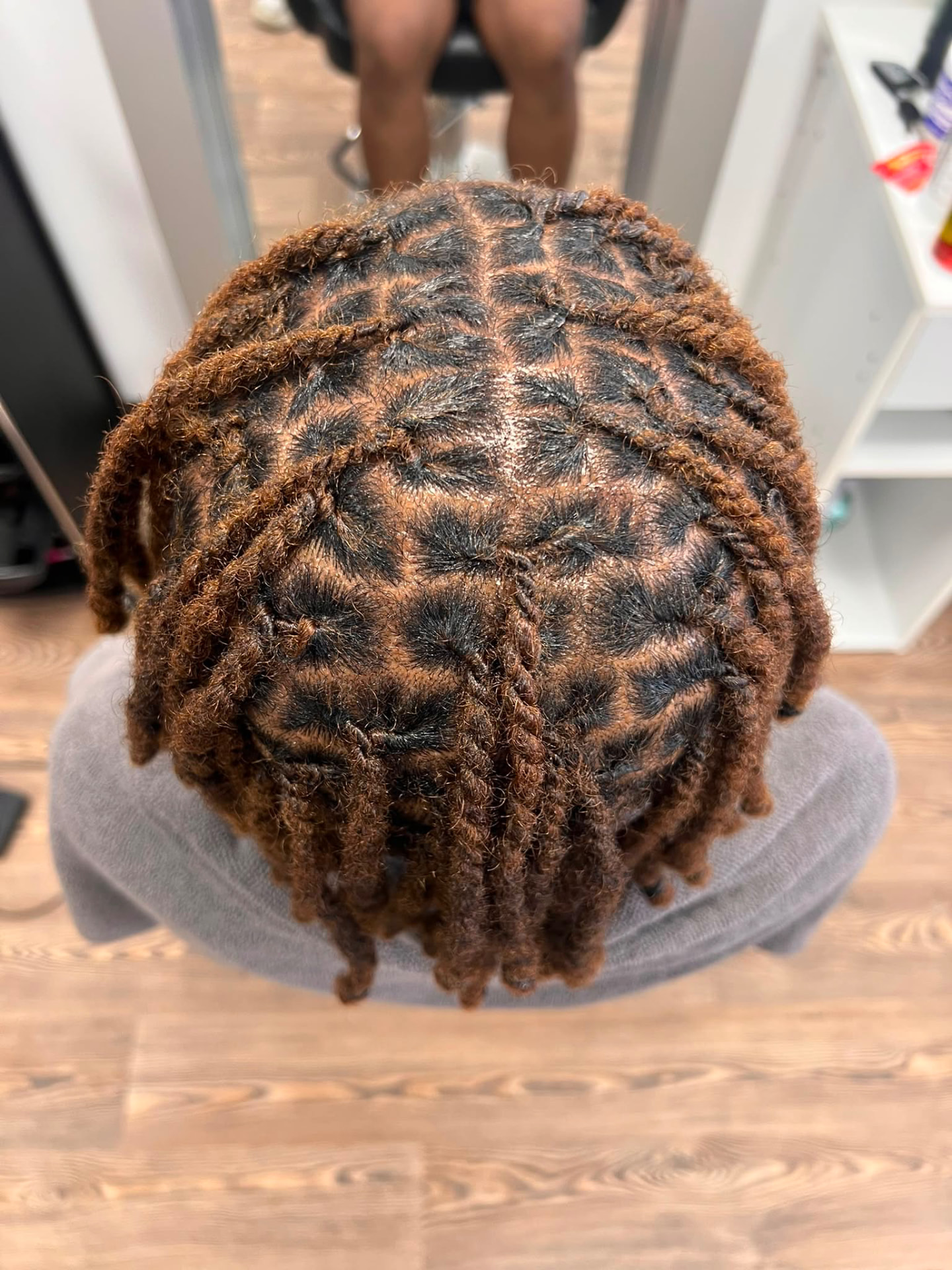 Auburn short loc retwist with precise geometric parting