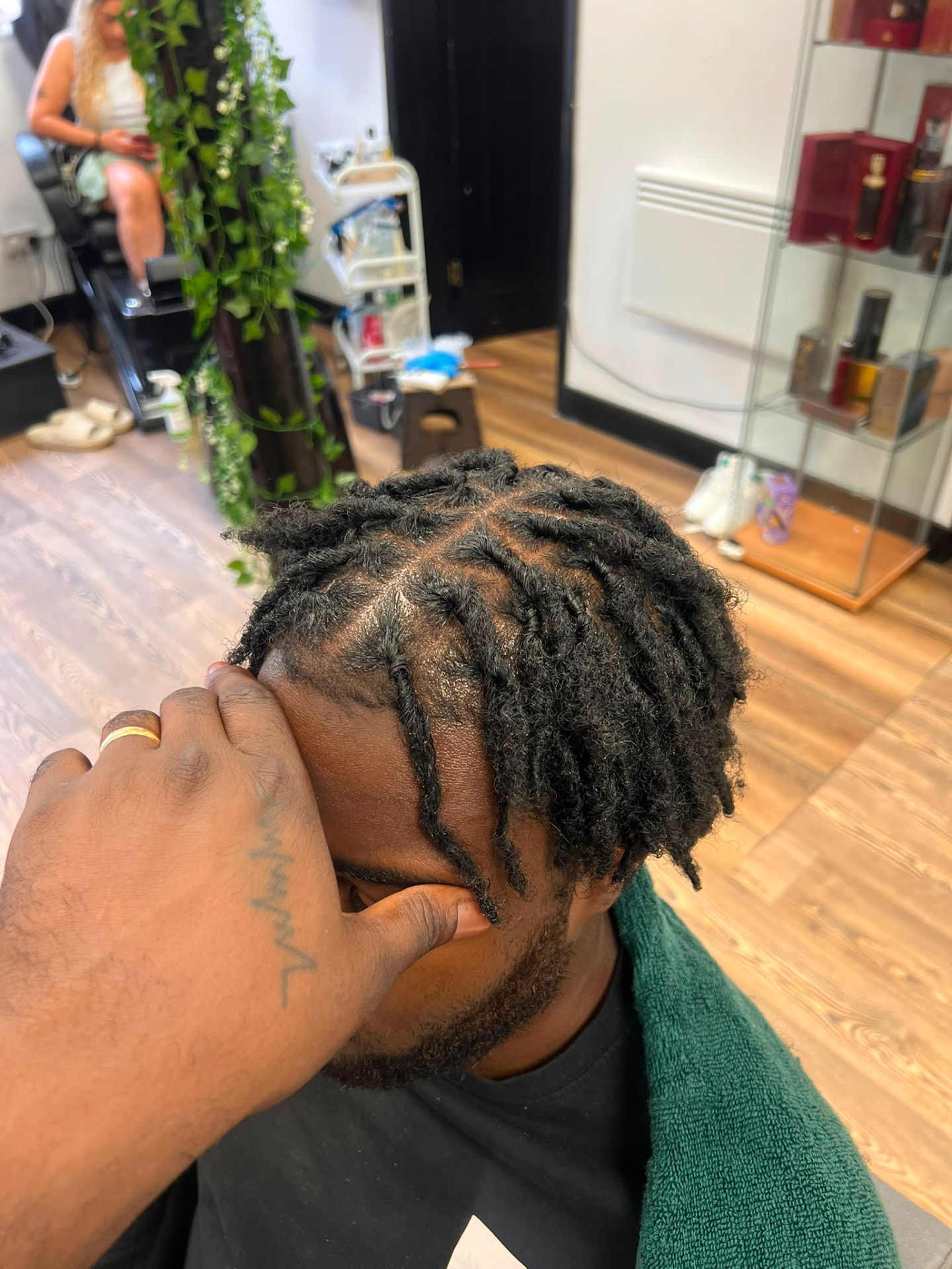 Finished short loc retwist on a male client